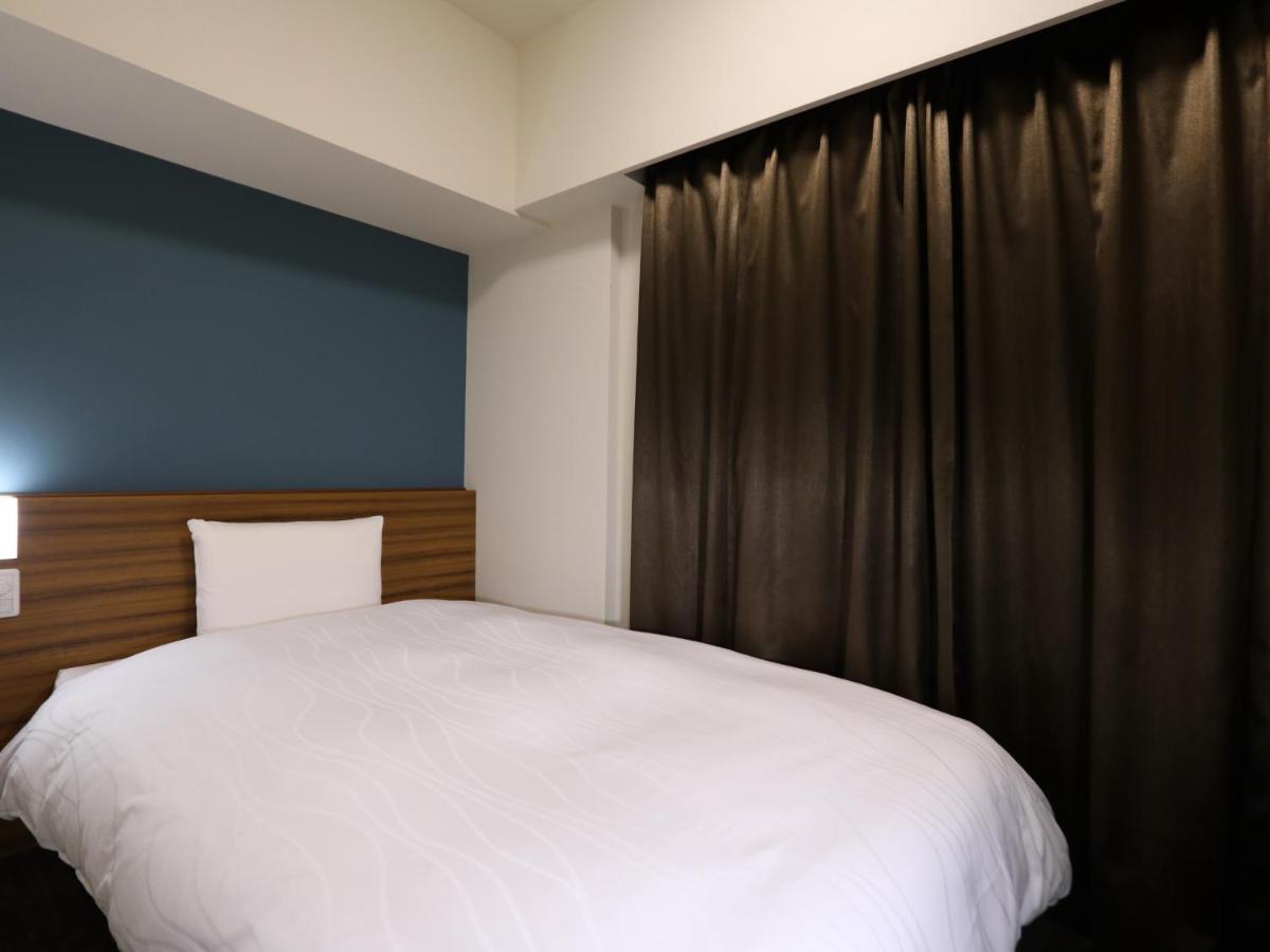 Dormy Inn Ikebukuro Токио Номер фото